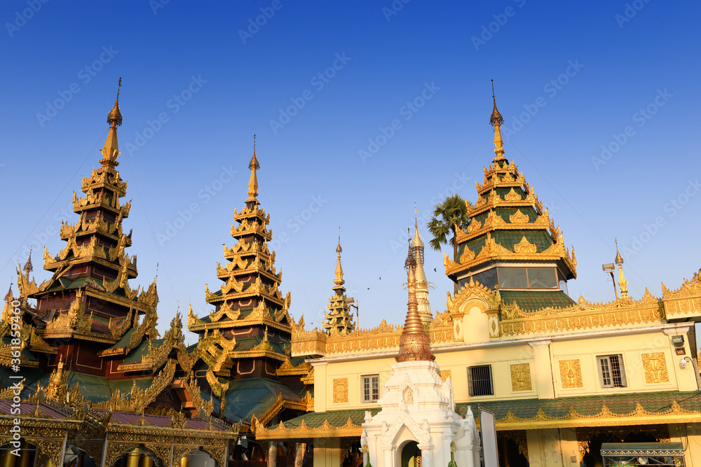 group of golden stupas at the Shwedagon Pagoda in Yangoon, Myanmar (Burma)
