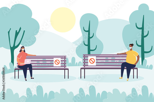 interracial couple practicing social distancing in park chair