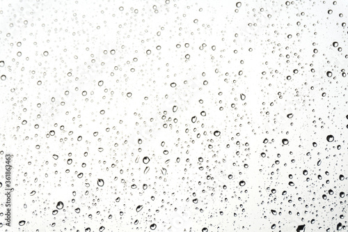 Water drops on glass. Rain droplets on window surface