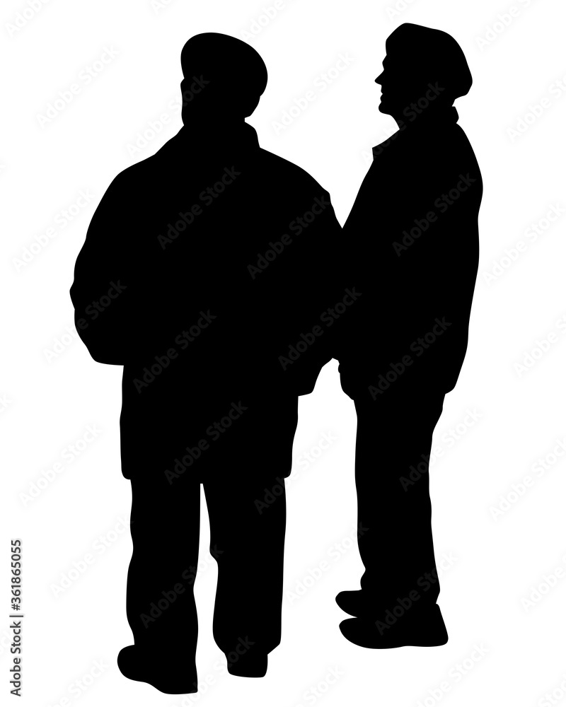 Two men are standing and talking. Isolated silhouettes on a white background