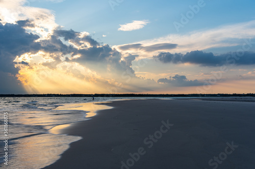 Sunset at the Inlet with distant people © Tom Ramsey