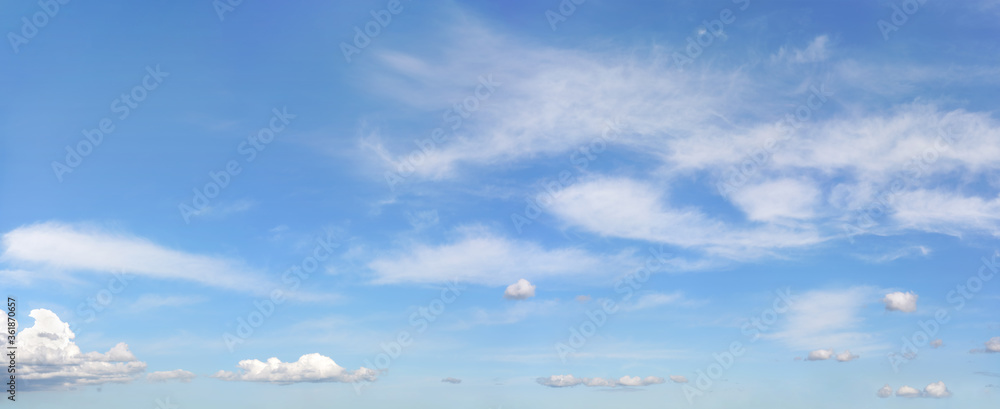 Bright sky background with few cirrus clouds above and small ones in lower part Bright sky background with few cirrus clouds above and small ones in lower part
