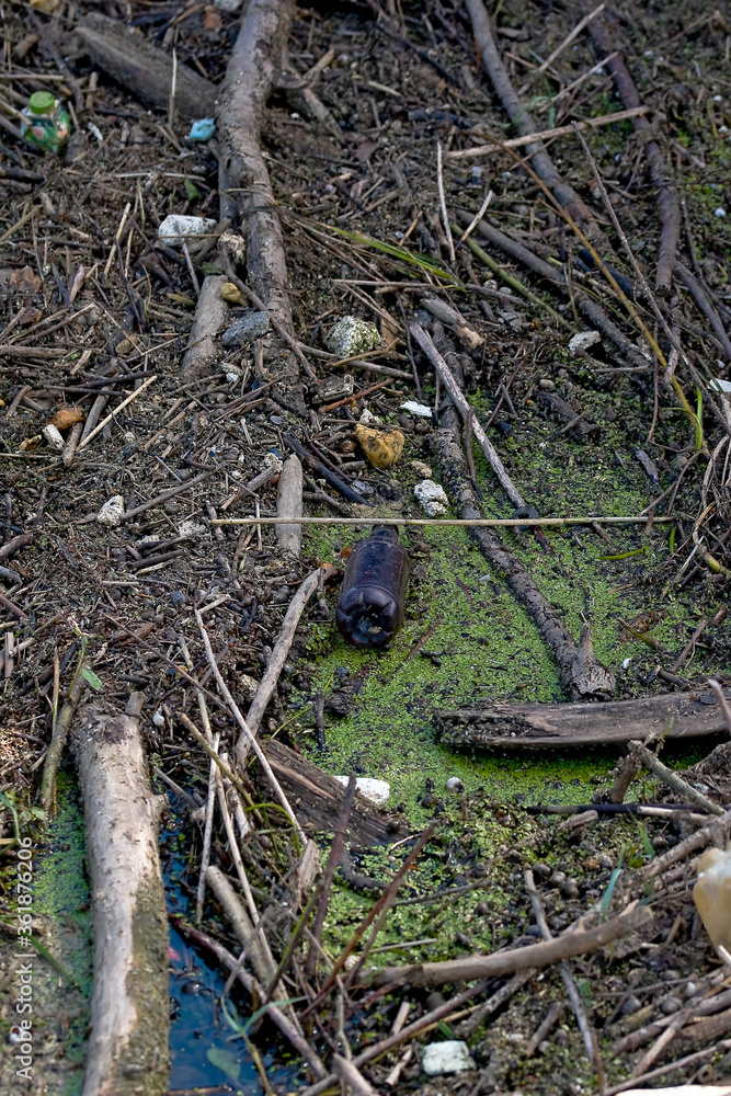 Floating old garbage in water, plastic bottles Floating old garbage in water, plastic bottles