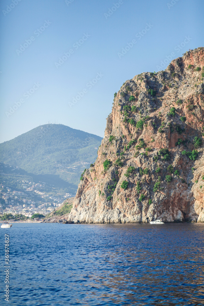 the coast of the Mediterranean sea taken from the water