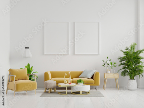 Poster mockup with vertical frame standing on floor in living room interior with yellow sofa. © Vanit่jan