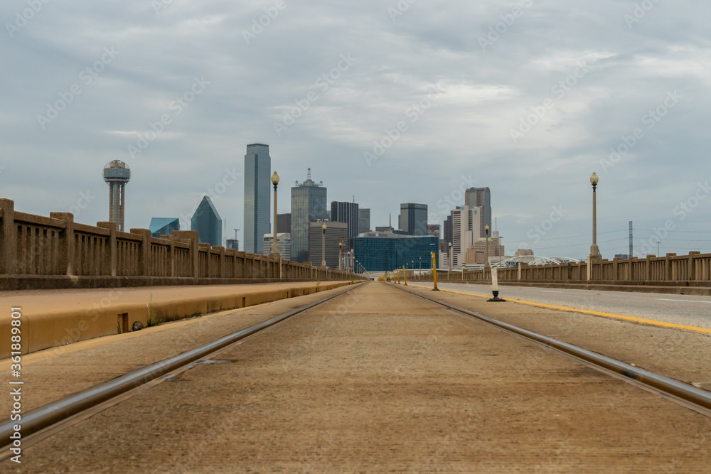 Low Angle View Tracks Leading into Downtown Dallas City