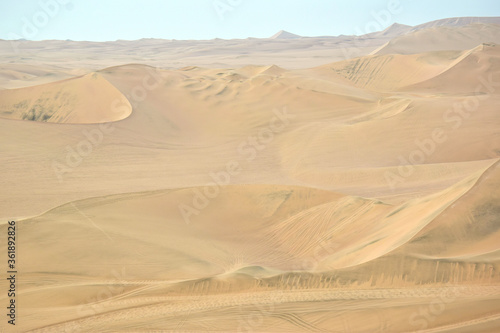 Fototapeta Naklejka Na Ścianę i Meble -  sand dunes in the desert in Huacachina, Peru
