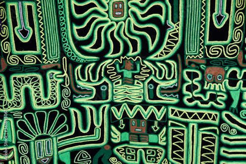 Картината върху платно Woven and embroidered wall hanging on display for sale at tourist market in Peru