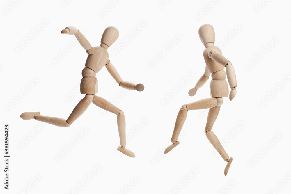 Wooden dummies models playing soccer Wooden dummies models playing soccer
