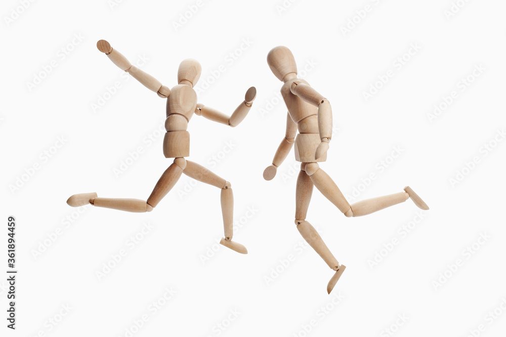Wooden dummies models playing soccer Wooden dummies models playing soccer