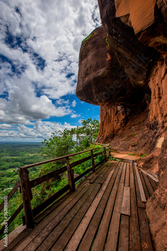 Background of wooden walkways (wooden bridges) created for high-angle views on mountains, natural attractions, or parks that have forest preservation