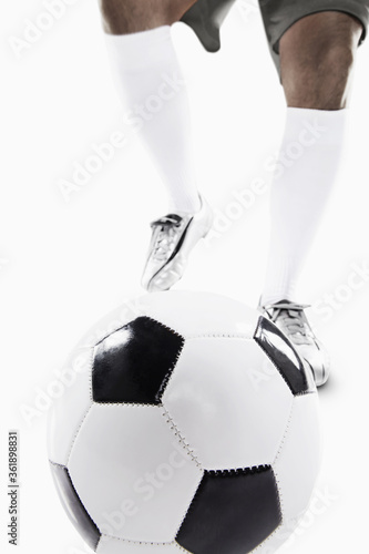 A soccer player ready to kick off
