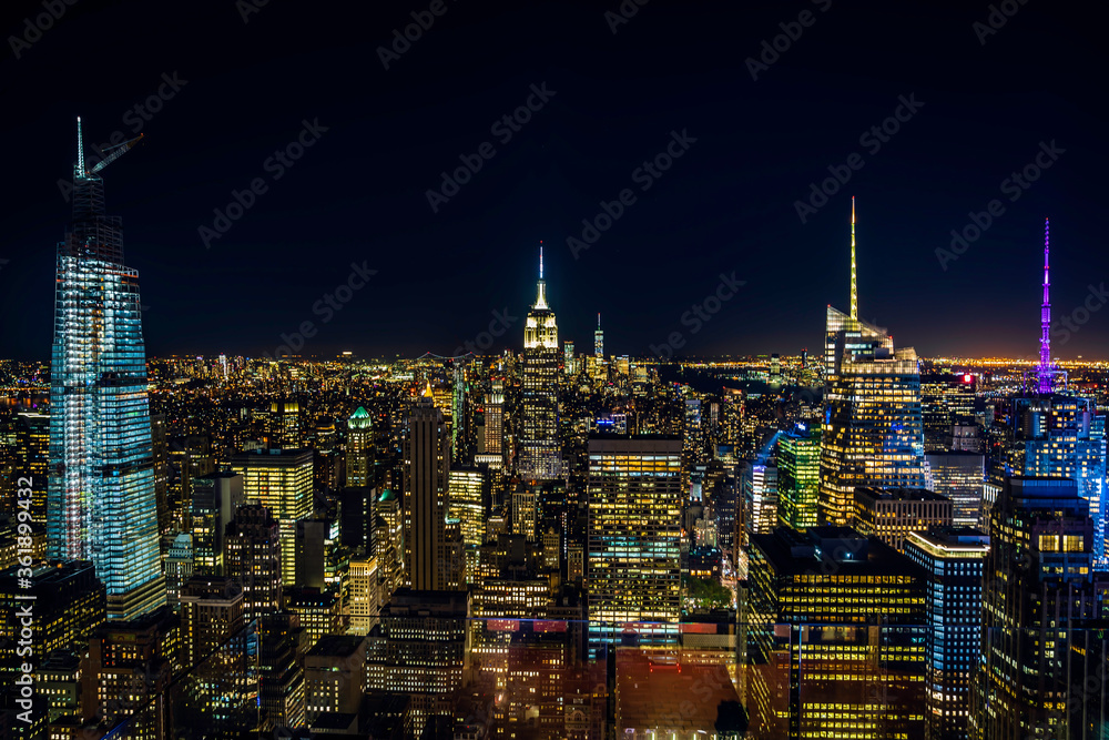 New York City, USA. Night aerial view of Midtown Manhattan skyscrapers from a high viewpoint.