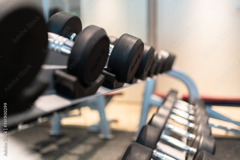 dumbbell on a wooden table dumbbell on a wooden table