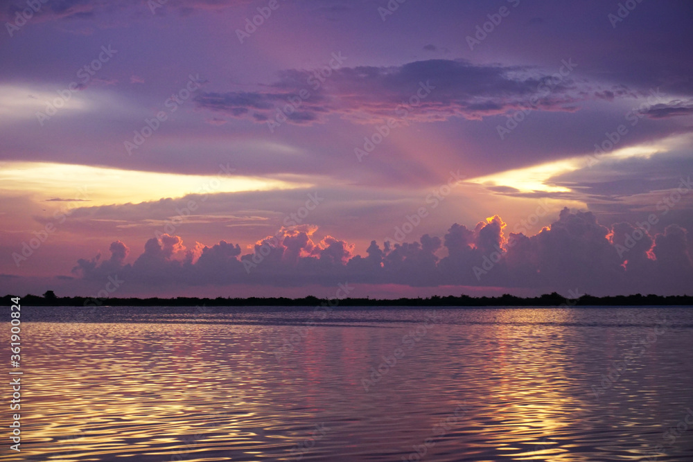 Sunset across the Tonle Sap Lake in Cambodia Sunset across the Tonle Sap Lake in Cambodia