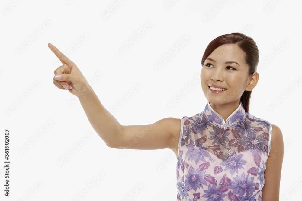 Woman in traditional clothing showing hand gesture Woman in traditional clothing showing hand gesture