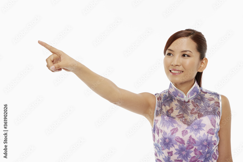 Woman in traditional clothing showing hand gesture Woman in traditional clothing showing hand gesture