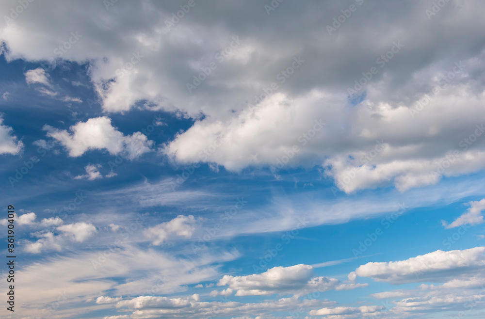 background of white clouds in a blue sky