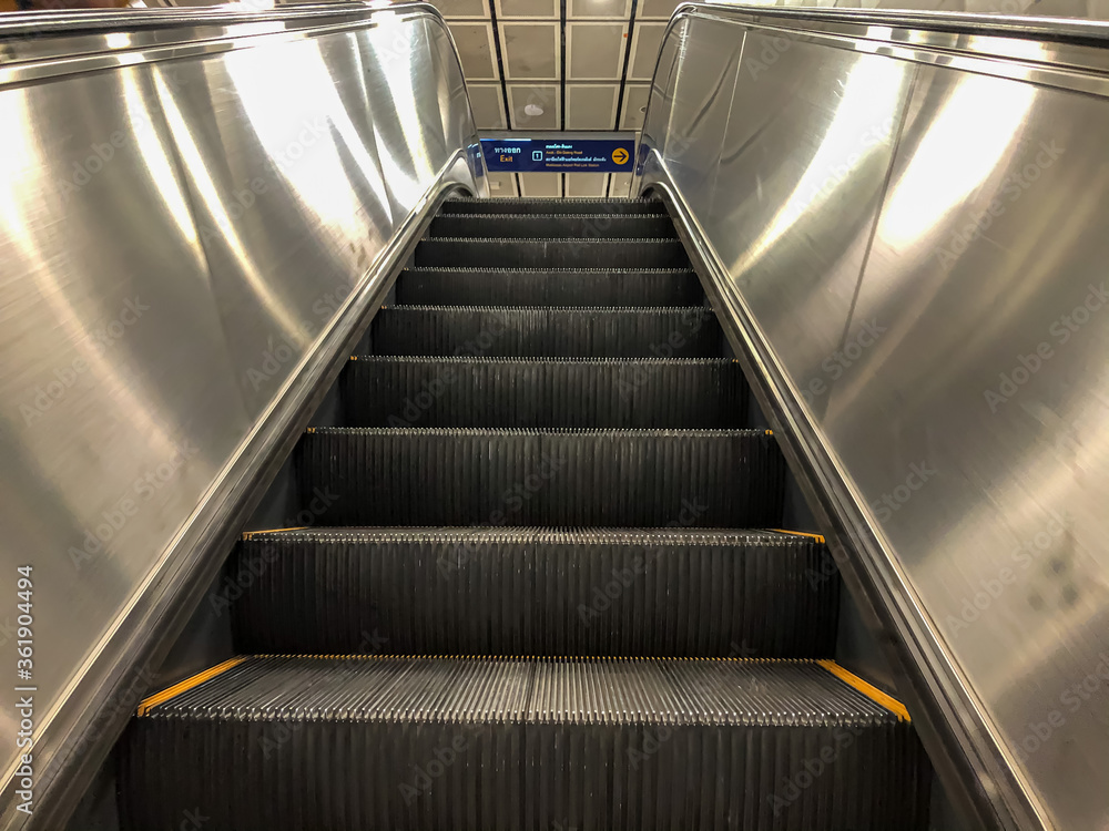 Modern luxury escalators with staircase at the subway. Modern luxury escalators with staircase at the subway.