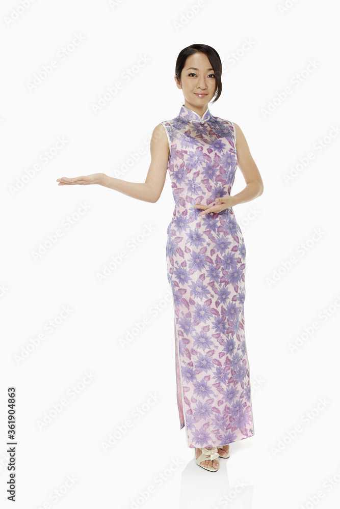 Woman in traditional clothing showing hand gesture Woman in traditional clothing showing hand gesture