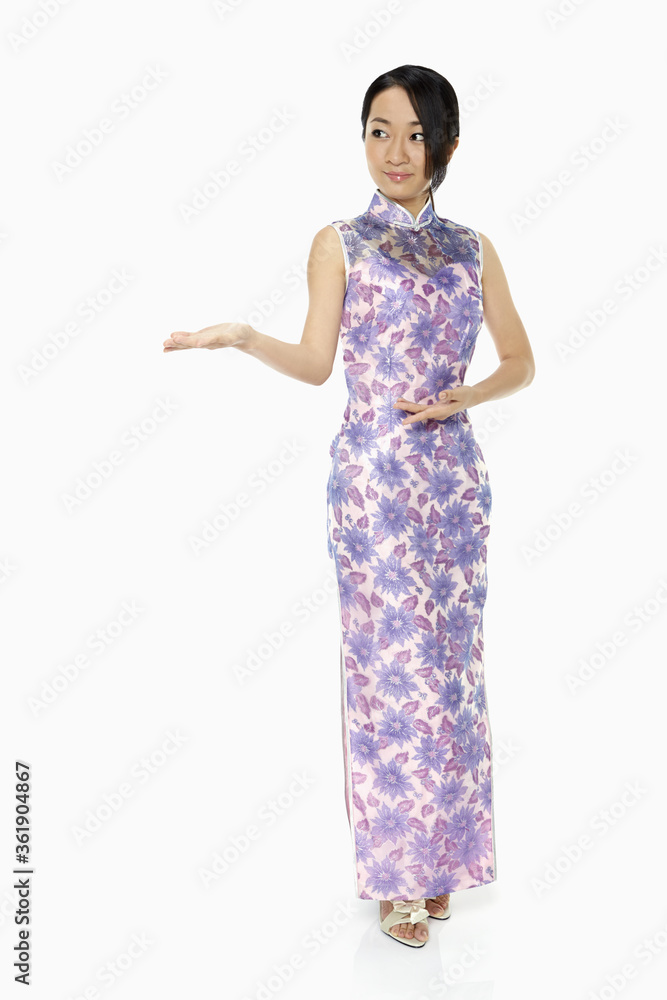 Woman in traditional clothing showing hand gesture Woman in traditional clothing showing hand gesture