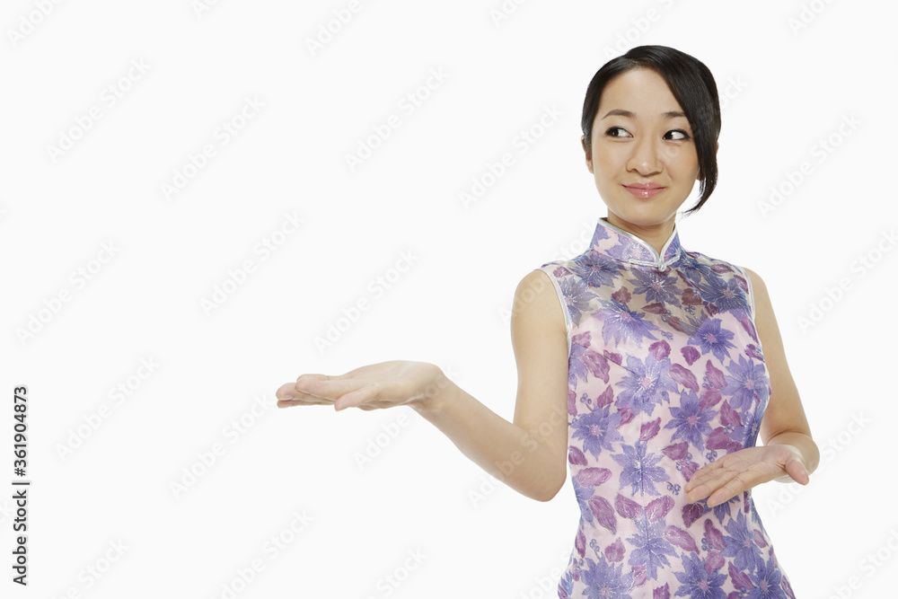Woman in traditional clothing showing hand gesture Woman in traditional clothing showing hand gesture