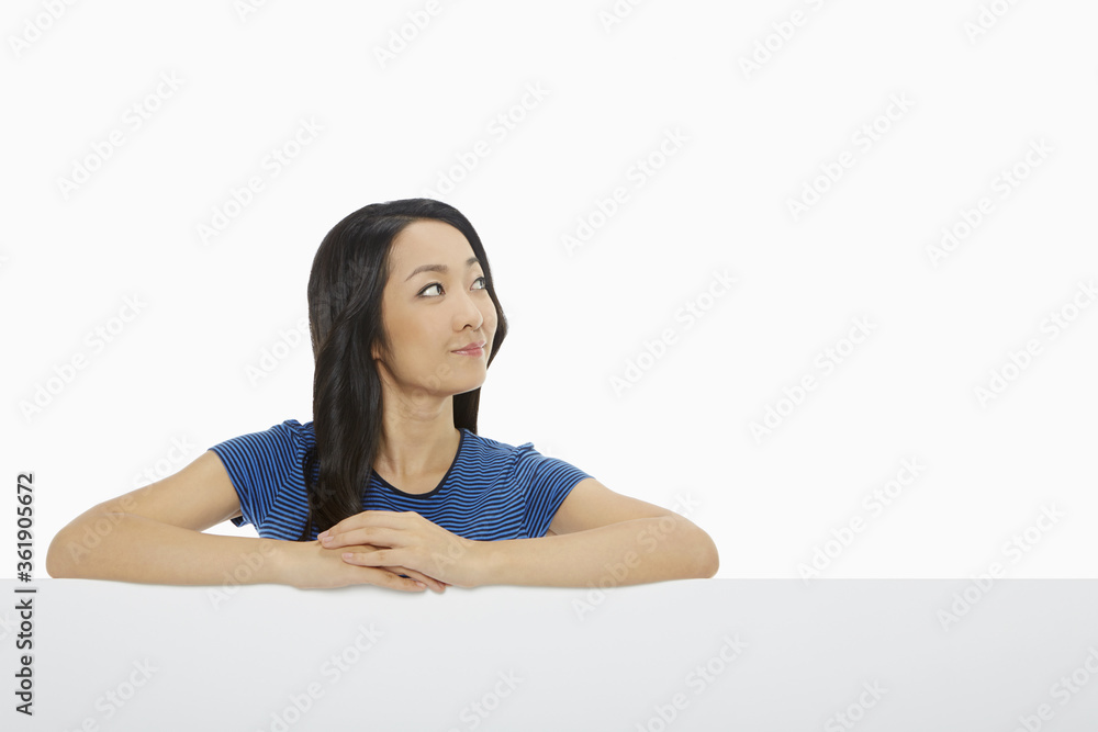 Cheerful woman looking away from the camera Cheerful woman looking away from the camera