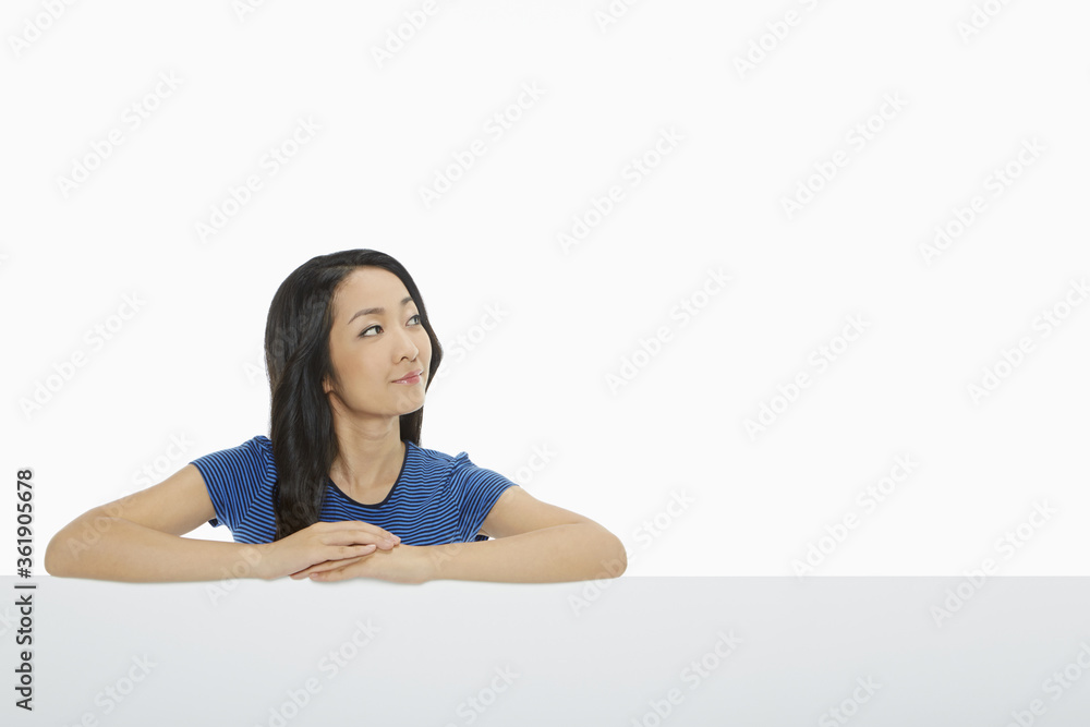 Cheerful woman looking away from the camera Cheerful woman looking away from the camera