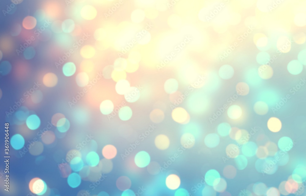 Golden garland lights on blue blurred background. Defocused bokeh pattern. Abstract confetti glitter. Golden garland lights on blue blurred background. Defocused bokeh pattern. Abstract confetti glitter.
