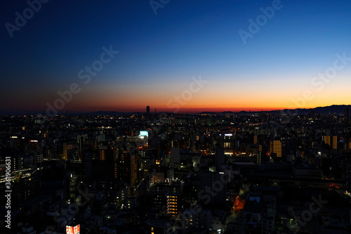 A bird's-eye view of Osaka's Minami district at night after sunset