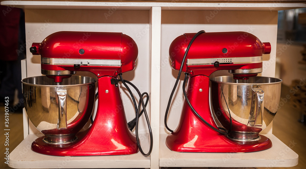 Red kitchen mixers on the shelf. Red kitchen mixers on the shelf.