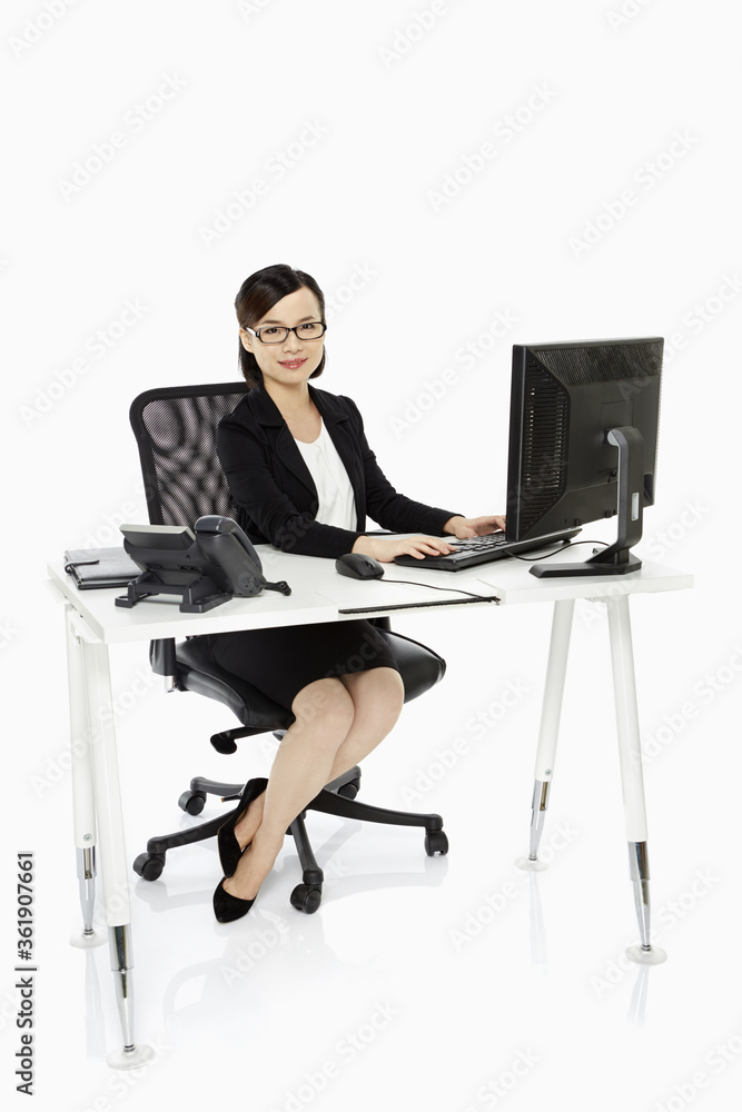 Businesswoman working on a computer Businesswoman working on a computer