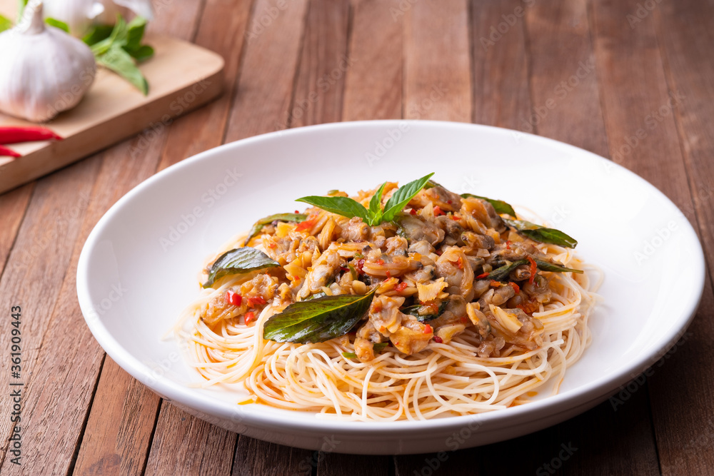 Stir fried capellini pasta with Short Necked Clam .Thai style food