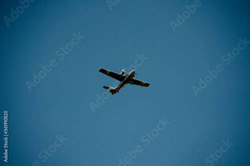 Fototapeta Naklejka Na Ścianę i Meble -  Airplane flying in the blue sky