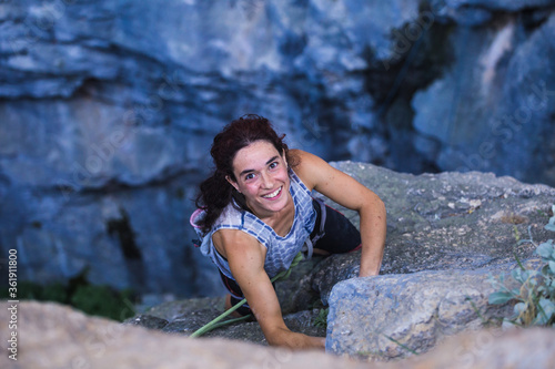 A woman is climbing in Turkey, Turkish woman climbs the rock.