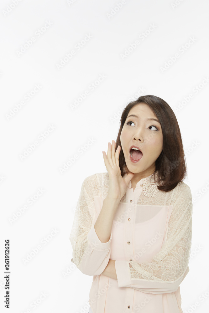 Woman with a shocked facial expression Woman with a shocked facial expression