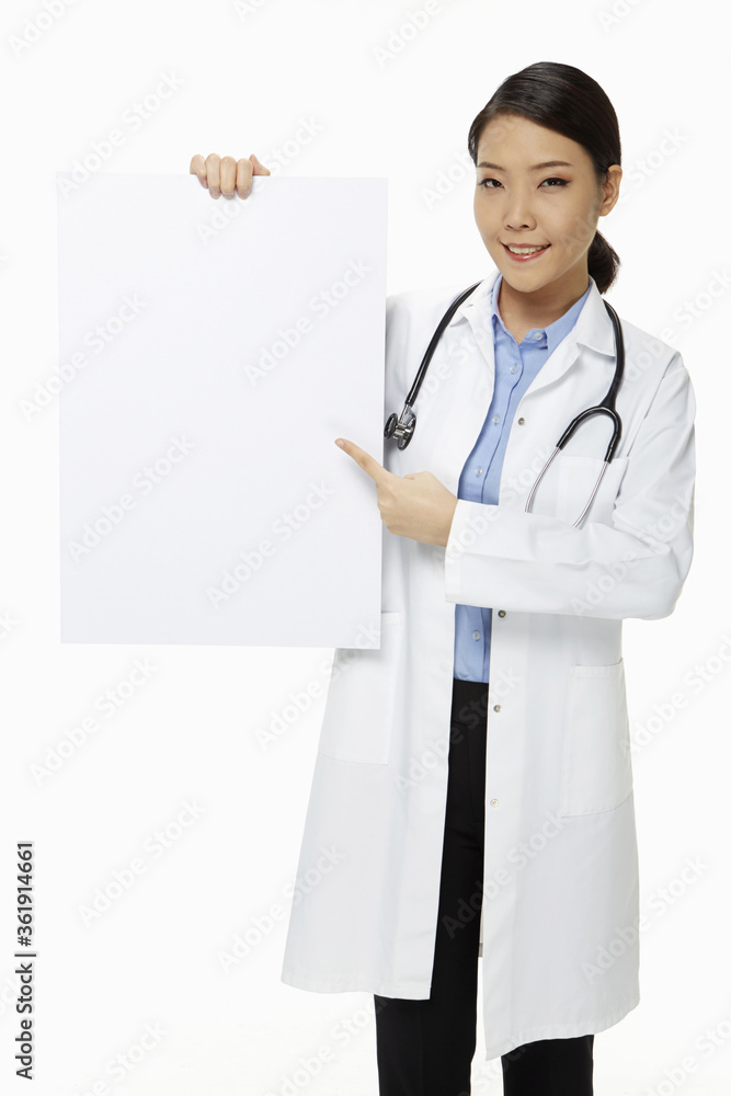 Medical personnel holding up a blank placard Medical personnel holding up a blank placard