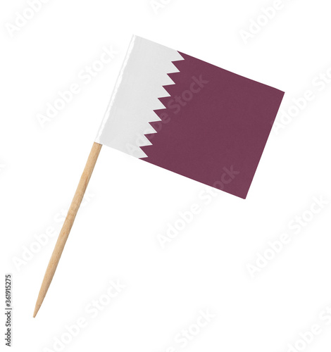 Small paper flag of Qatar on wooden stick