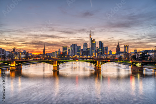 Beautiful sunset over downtown Frankfurt and the river Main
