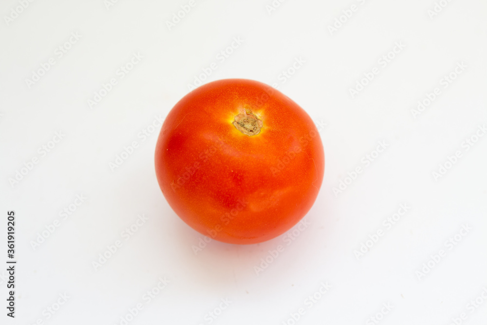 red tomato on a white background red tomato on a white background