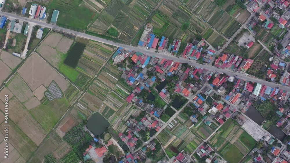 Hai Duong, Vietnam Jan 2020 4k aerial video of Hai Duong skyline during midday from above with huge rice field and Kinh Thay river Hai Duong, Vietnam Jan 2020 4k aerial video of Hai Duong skyline during midday from above with huge rice field and Kinh Thay river