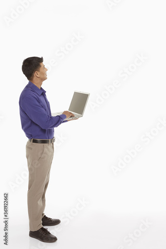 Businessman using a laptop © ImageHit