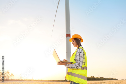 Female engineer on windmill...