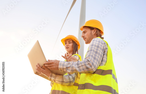 Engineers on windmill farm ...