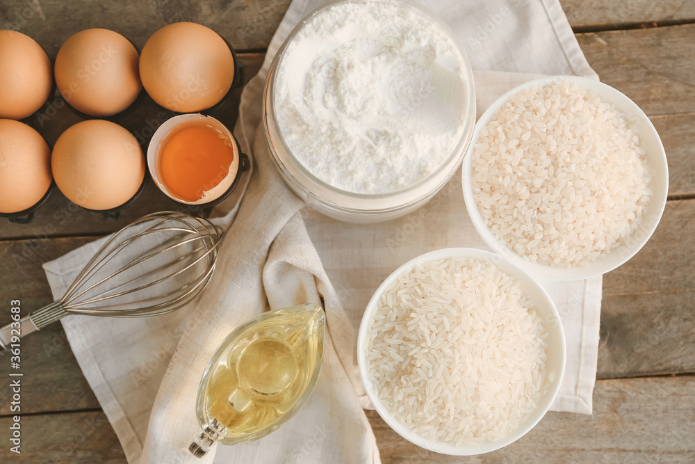 Rice with flour and products on table Rice with flour and products on table