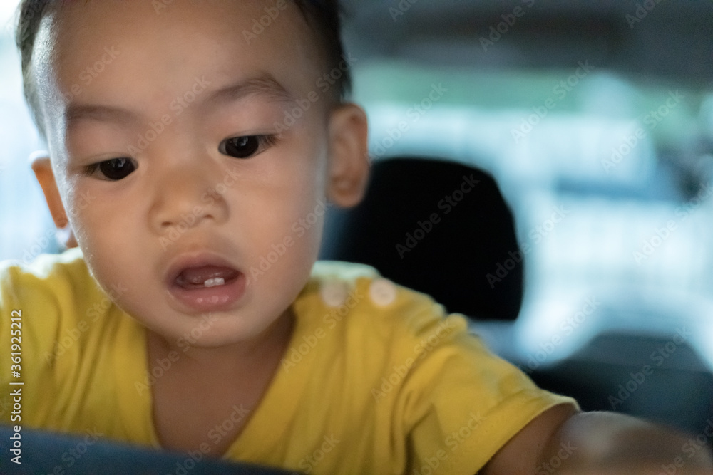 1 Year Old Adorable Asian Boy Playing and Looking Around in the Car 1 Year Old Adorable Asian Boy Playing and Looking Around in the Car