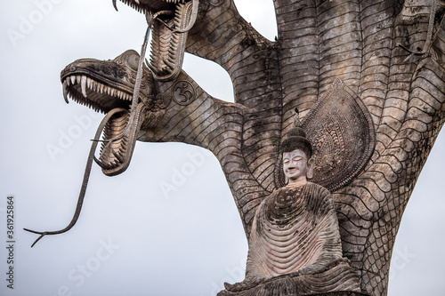 Sala Keoku-Nongkhai:June19,2020,the atmosphere inside the religious tourist site,there is a garden and a corridor around a large sculpture,tourists come to see the beauty of the holiday,Thailand