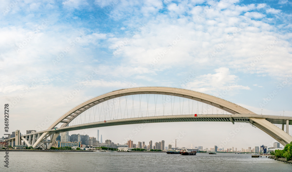Panorama view of Lupu Bridge, on of the biggest bridge on Huangpu river, shot in Shanghai, China. Panorama view of Lupu Bridge, on of the biggest bridge on Huangpu river, shot in Shanghai, China.