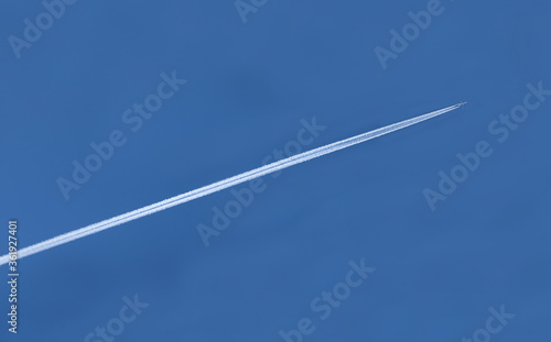 white trail of an airplane