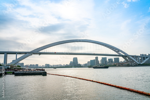 Panorama view of Lupu Bridge, on of the biggest bridge on Huangpu river, shot in Shanghai, China. © Zimu